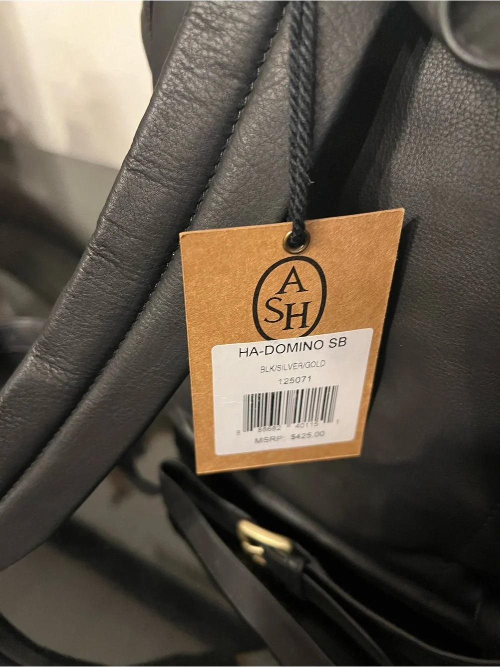 Ash Black Leather Backpack with Gold and Silver Chain Accents